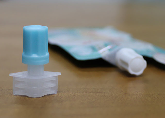los casquillos plásticos del canalón del color azul del calibre de 5m m para el cuidado de piel Doypack/la bolsa de los alimentos para niños rematan