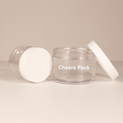 Cuidado de la piel de venta al por mayor exfoliante para el cuerpo vacío PET Jar Contenedor transparente Botellas redondas de plástico para el cuerpo con tapas