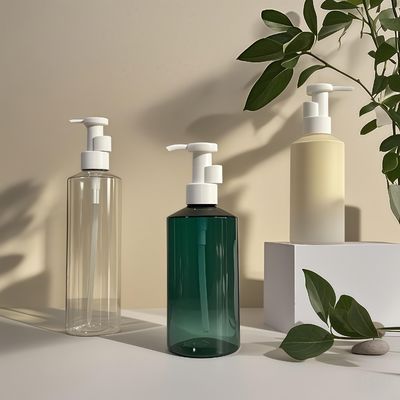 Botella con bomba de loción cilíndrica de PET de 300 ml-500 ml para envasado de cosméticos con impresión de logotipo personalizable
