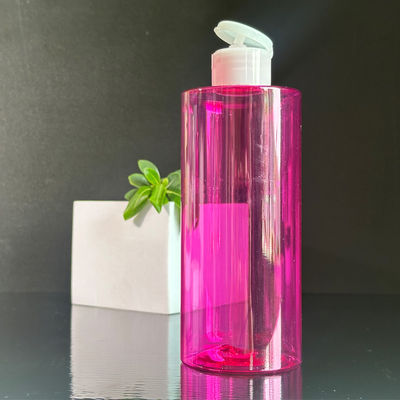 Suministro personalizado Botella de loción de plástico PET de color rojo transparente con tapa de disco de prensa y capacidad de 300/400/500 ml