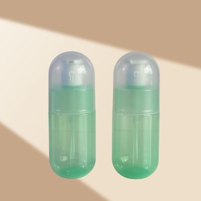 Botella dispensadora con bomba de PET verde transparente de 300 ml de capacidad para loción cosmética con logotipo personalizado